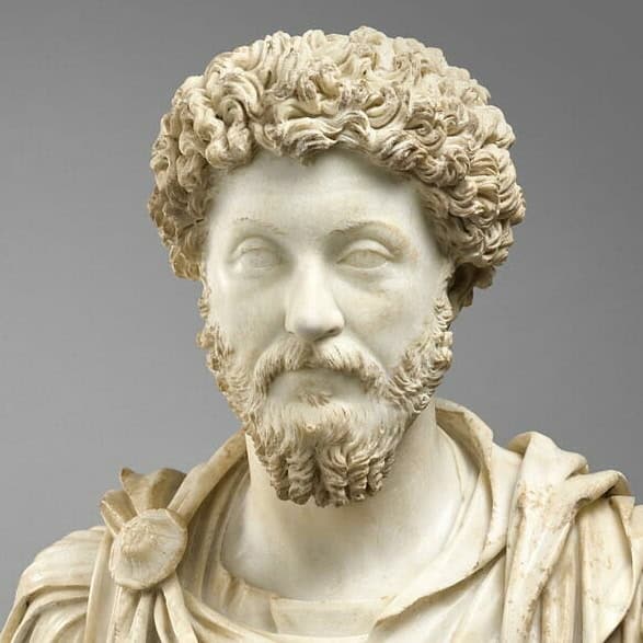 a statue of a man with a beard Marc aurele